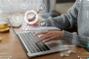 typing on laptop with AI symbols 300x200 - typing on laptop with AI symbols