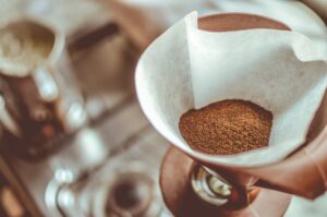 coffee on a white strainer 300x199 - coffee on a white strainer