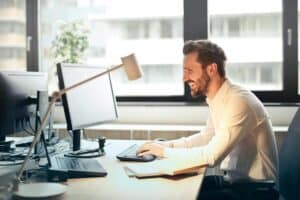 man in white dress shirt sitting on black rolling chair while facing black computer set and smiling 300x200 - man in white dress shirt sitting on black rolling chair while facing black computer set and smiling.jpg
