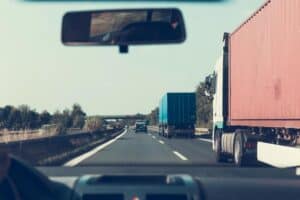 blue and red freight truck on road 300x200 - blue and red freight truck on road.jpg