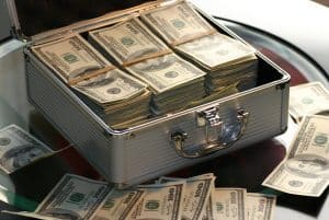 hard cash on a briefcase 300x201 - hard cash on a briefcase