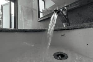 black and white shot of water running from tap 300x201 - black and white shot of water running from tap