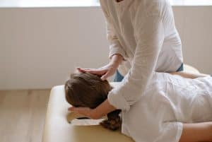 chiropractor doing neck alignment to a patient 300x201 - chiropractor doing neck alignment to a patient