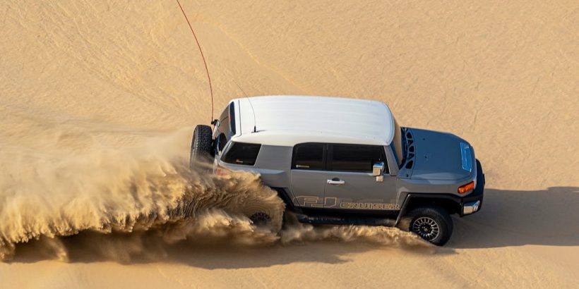 a truck on sand dune 820x410 - Can You Use Any Flag for Offroading? Find Out Why