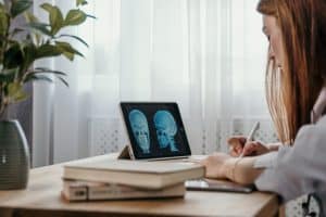 A Doctor Writing a Diagnosis 300x200 - A Doctor Writing a Diagnosis